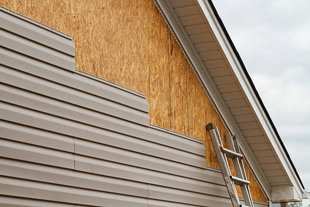 Professional Siding Replacement technician working in Fort Bragg, NC